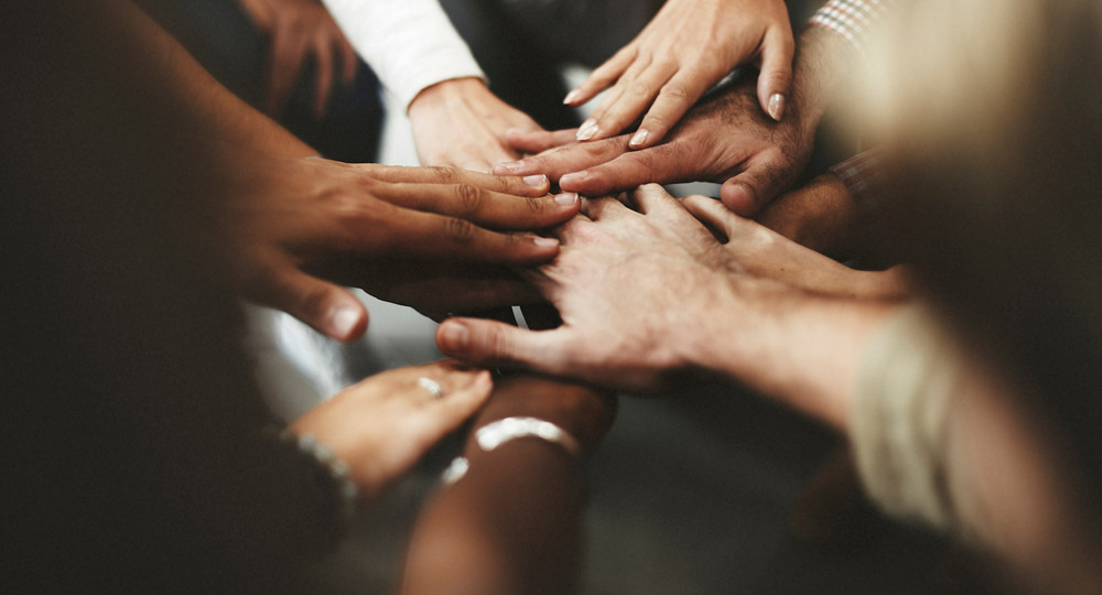 Hands in a group