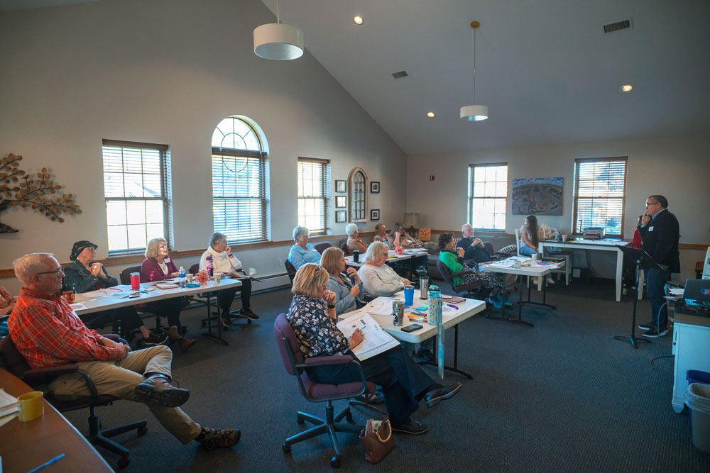 WMHTC Meeting with people at tables.